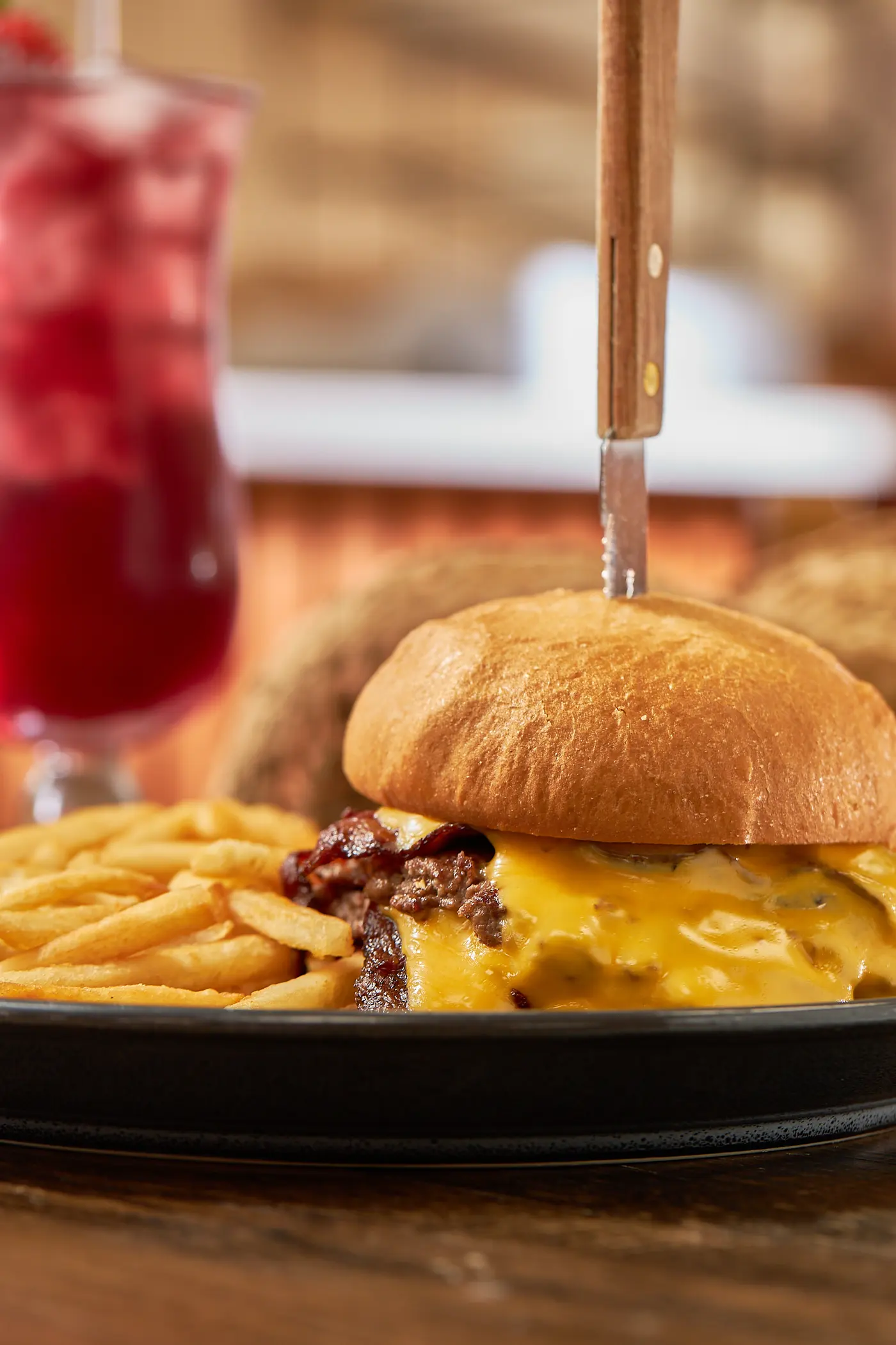 Handcrafted burger with fries